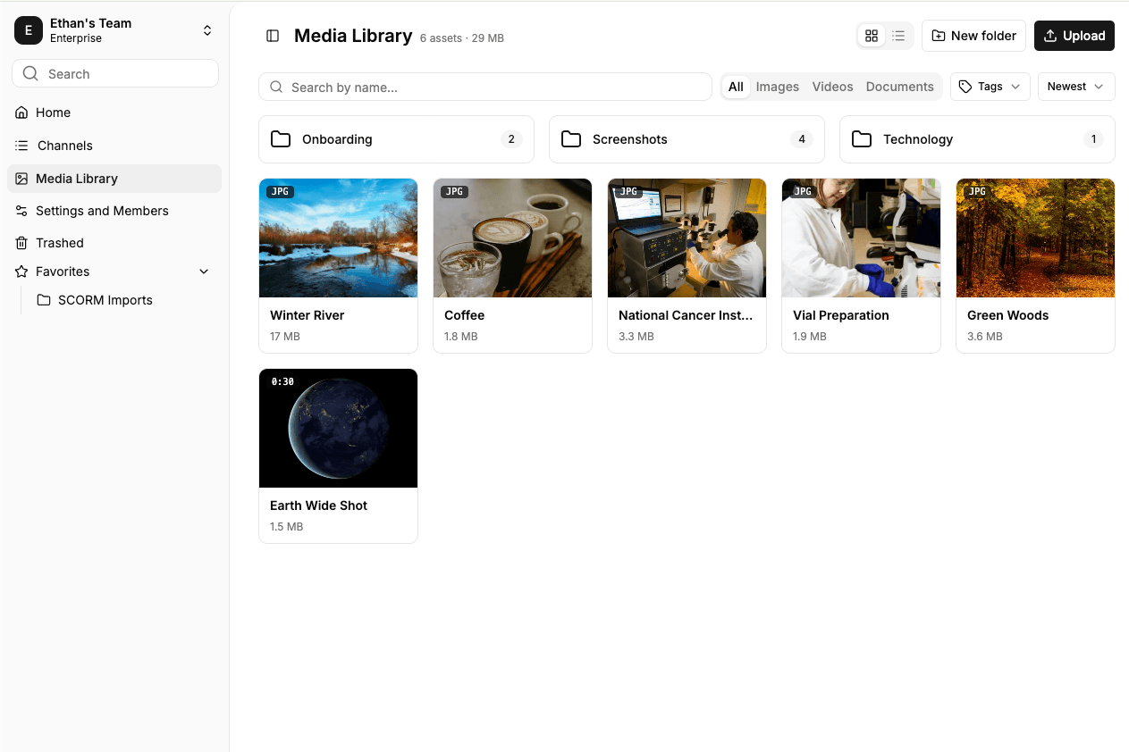 The Media Library page showing folders above a grid of assets